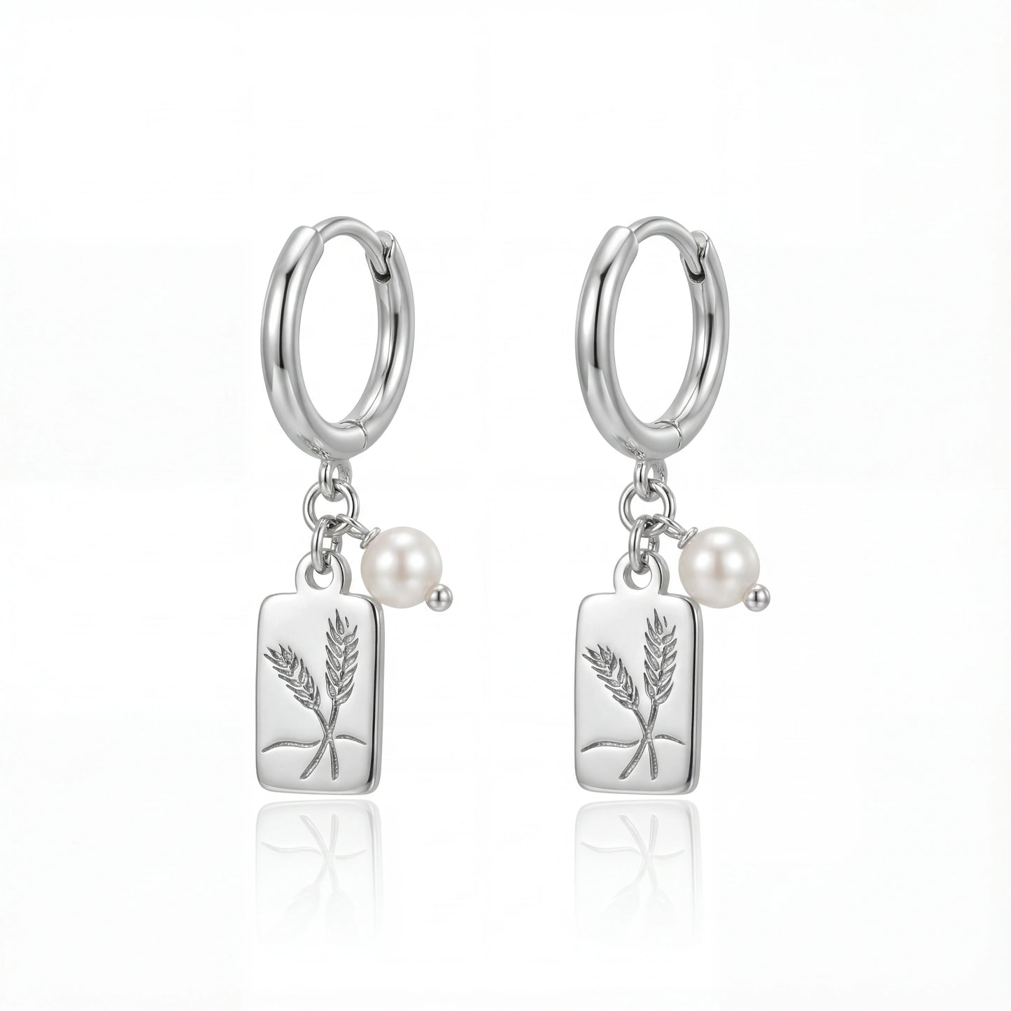 עגילי חישוק AVE ERRINGS אלגנטיים מבית Lidi, עשויים מסטיינלס סטיל עם תליוני כסף קלאסיים, מושלמים לכל אירוע.