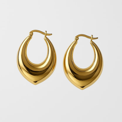 עגילי ALMOG EARRINGS GOLD מזהב מלוטש, חישוקים נפוחים בצורת טיפה, מבט מלפנים על רקע בהיר.
