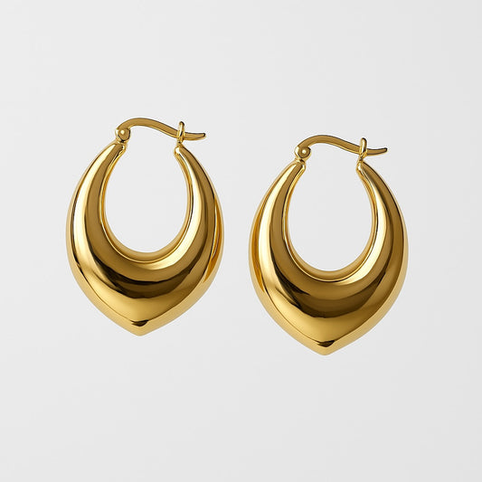 עגילי ALMOG EARRINGS GOLD מזהב מלוטש, חישוקים נפוחים בצורת טיפה, מבט מלפנים על רקע בהיר.