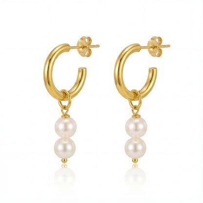 עגילי חישוק ALIN EARRINGS יוקרתיים מבית Lidi, משובצים פנינים אלגנטיות וזוהרות מפלדת אל-חלד.